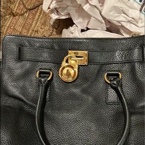 Michael Kor’s satchel black brand new ,Genuine leathe purse Gold hardware,